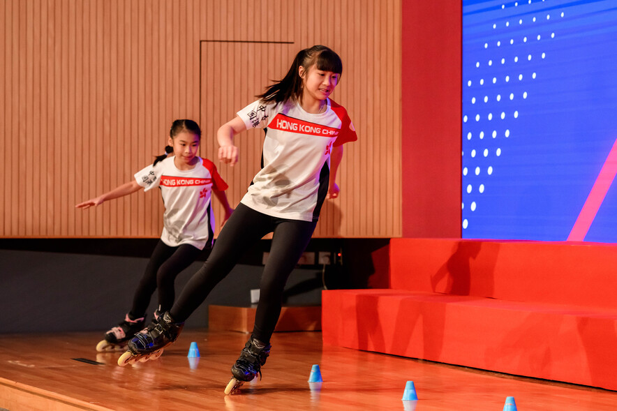 <p>Roller sports athlete Li Yuet-yi (left) and Chan Yin-lam Sevina (right) showcase their skills in classic slalom.</p>
